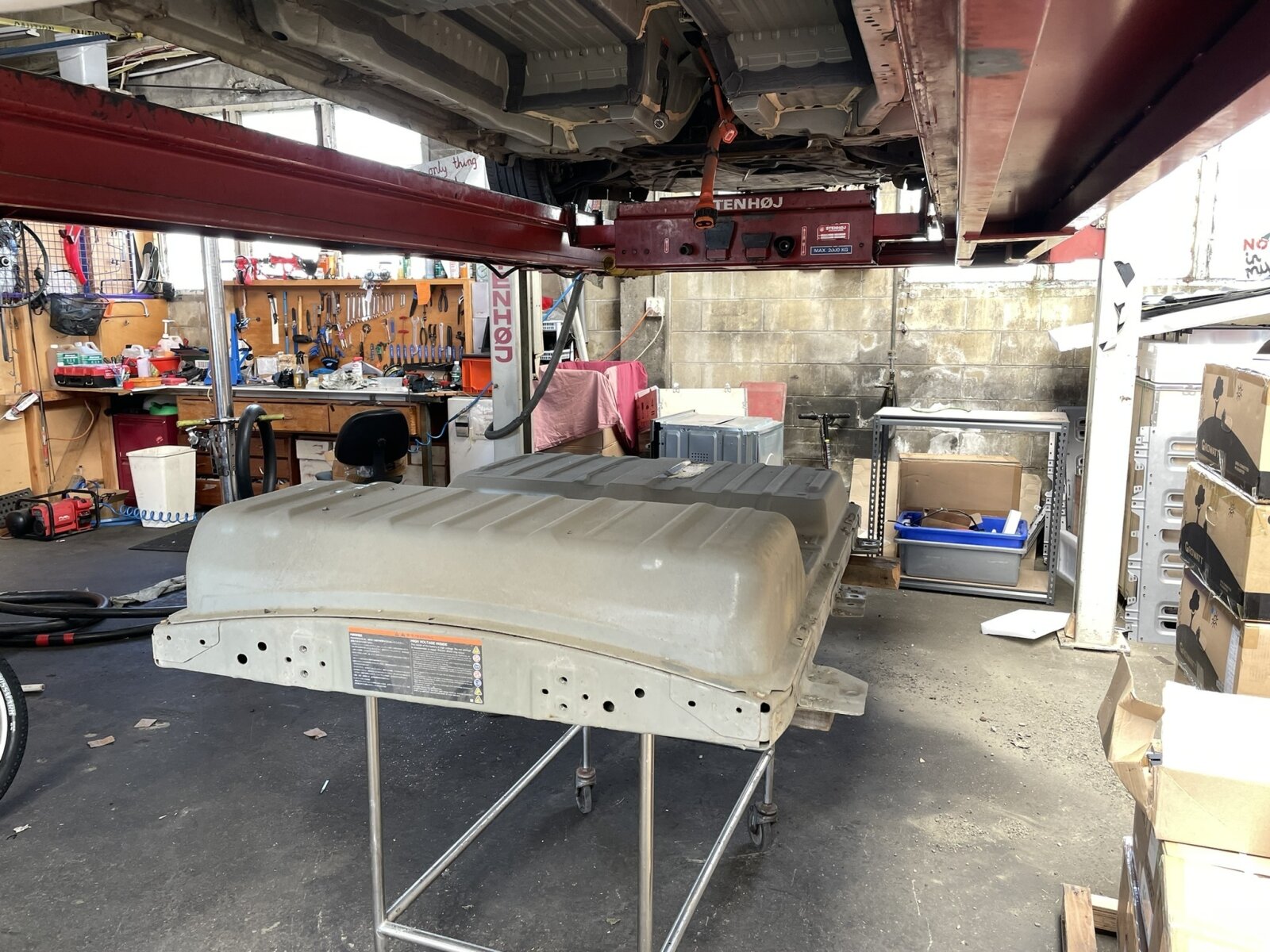 Swapping
Leaf battery packs using a 4-post car hoist