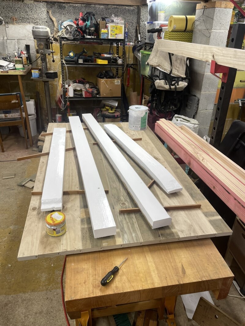 Painting
door frame, atop in-progress door