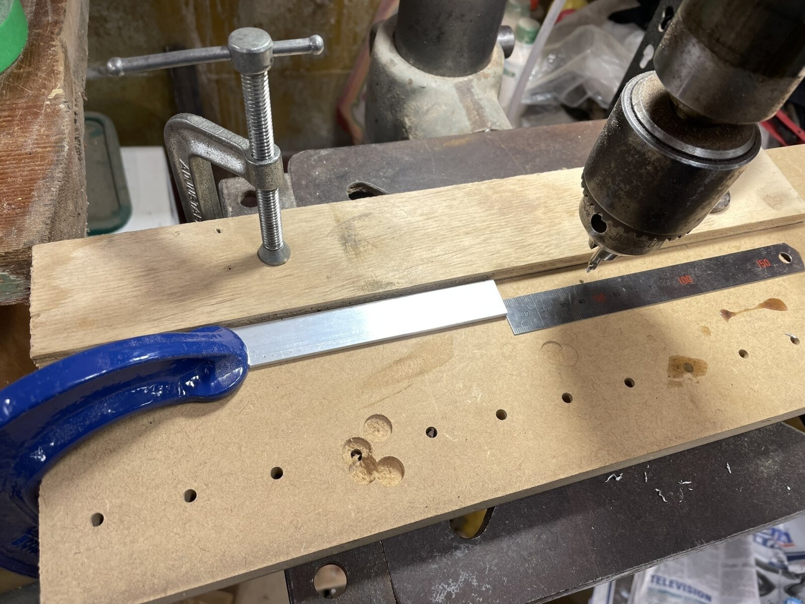 Setting up
drill press for making bus bars